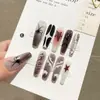 Puntas de uñas vestibles de moda europea y americana, parches de uñas desmontables con temática navideña, arte de uñas estilo largo 'hot girl' vestible al por mayor