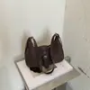 Bolso de mujer súper popular para otoño e invierno 2026 nueva moda moderno de alta gama bandolera de gran capacidad bolso cruzado tipo albóndiga