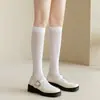 Meias de veludo de bezerro cano alto populares pretas e brancas de comprimento médio meias clássicas japonesas acadêmicas finas meias JK