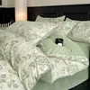 Lujoso juego de ropa de cama de cuatro piezas de terciopelo de leche floral de invierno, nuevo estilo 2026, con sábanas y fundas de edredón de vellón de coral, además de ropa de cama con forro de vellón