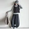 Conjunto de otoño para niña 2026 nuevo estilo coreano chaleco de punto, camiseta básica y pantalones de pierna curva conjunto de tres piezas
