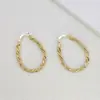 Aretes de aro redondos de cáñamo caliente transfronterizos, aretes dorados, temperamento de moda europeo y americano, combinan con todo, aretes que no se decoloran