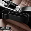 Suministros para Coche Daquan Caja de Almacenamiento para Relleno de Espacio de Asiento Decoración Interior de Coche Artefacto Esencial de Tecnología Negra para Coche