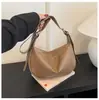 Bolso de PU estilo coreano nuevo para mujer, moderno y simple, bolso tipo empanada de alta gama y gran capacidad, bolsos de axila al por mayor