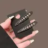 Elegante pasador de perlas para mujer, pinza metálica negra con lazo para el pelo, pinza lateral de alta gama, pinza para flequillo, pinza de pico de pato simple