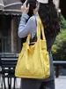 Bolsa Transfronteriza Nueva 2026, Bolso Tote Sencillo de Color Sólido, Bolso de Hombro Plegable de Gran Capacidad en Tela de Nylon para Mujer