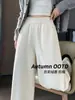 Calça feminina reta de bolso inclinado com textura plissada branca, novo 2026 outono/inverno, cintura alta, com caimento, modelagem que afina, ajuste justo, perna larga, calça banana