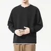 Camiseta de manga larga de color liso para hombre, estilo dos piezas falso, nueva colección primavera y otoño 2025, holgada y versátil, adecuada para usar en capas, sudadera de algodón con cuello redondo
