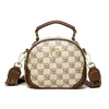 Moda Nova Primavera 2025 Bolsa Redonda Pequena Super Popular Bolsa de Ombro de Celebridade da Internet Bolsa Transversal de Nicho Tendência para Mulheres Mulheres