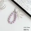 Nueva Cadena para Teléfono Móvil con Lazo de Perlas Bolso de Niña Colgante Exquisito Cuerda de Cuentas Rosas Cuerda de Muñeca Llavero de Coche