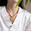 Nuevo Estilo Chino Mismo Estilo de Blogger Colgante de Alta Calidad Cordón Tejido a Mano Colgante de Brújula Babao Cadena de Lana