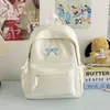 Mochilas Pequenas Leves com Laço de Alta Qualidade no Atacado, Mochilas Escolares Minimalistas Estilo Japonês para Estudantes do Ensino Médio, Bolsas Versáteis de Duas Alças