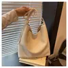 Bolsa Feminina de Grande Capacidade Transfronteiriça 2026 Nova Outono e Inverno Versátil Simples Ombro Transversal Bolsa Mãe-Filha Bolsa Balde para o Trabalho