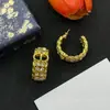 Venta al por mayor del Fabricante: Pendientes de Diamantes con Letra Cd de Nariz de Cerdo D-Brand, Pendientes Clásicos de Moda con Tachuelas, Superventas Transfronterizos, Estilo Influencer