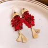 Brincos Gancho Personalizados Criativos Europeus e Americanos em Formato de Peixe com Tassel de Concha Estilo Resort à Beira-Mar Brincos Personalizados de Alta Qualidade para Mulheres
