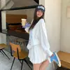 Camiseta básica T-shirt relaxada e casual estilo coreano para mulheres, novo modelo primavera e outono 2026, corte solto, top de manga comprida que cobre os quadris