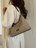 Bolso vintage de gran capacidad transfronterizo para mujer, nuevo bolso cruzado casual versátil de otoño 2026, bolso de hombro de lona para debajo del brazo
