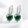Comercio electrónico transfronterizo venta de exquisitos pendientes de moda amor color tesoro hebilla de oreja estilo reina diosa joyería de oreja fabricantes al por mayor