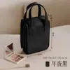 Bolsa de maquillaje tipo concha aprobada por influencers, bolsa de almacenamiento de maquillaje portátil de gran capacidad, bolsa de maquillaje impermeable y elegante