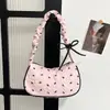 Bolsa Simples de Ombro para Axila Outono 2026 Nova Moda Feminina Bolsa Feminina Chic Estampa de Laço Bolsa de Ombro Único
