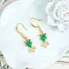 Pendientes de oro de arena método antiguo Guochao estilo étnico circón calcedonia pendientes pequeños de pez dorado para mujer joyería de lujo ligero de alta gama venta al por mayor