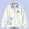 Conjunto de duas peças da moda e versátil: top cartoon estilo coreano para meninas para primavera e outono 2026, combinado com jeans estampado de estrelas