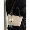 Bolsa Balde Portátil de Grande Capacidade para Mulheres 2026 Novo Estilo de Verão High-End Luxo Leve Nicho Versátil para o Dia a Dia Bolsa de Ombro