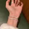 Pulsera de serpiente Niche Silver Spirit pulsera versátil de diseño simple versión serpiente espíritu de ojo rojo pulsera ajustable pulsera de textura de alta calidad