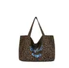 Bolsa de Lona Estampada de Leopardo Grande Capacidade Feminina 2026 Nova Outono Inverno Retrô Casual Versátil Bolsa de Ombro Única Bolsa Tote para o Dia a Dia