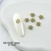 Pedras de Strass para Nail Art de Floco de Neve em Liga Metálica, Venda Quente Transfronteiriça, Bestseller de Inverno, Estilo 3D Versátil, Acessórios de Unha de Floco de Neve Dourados e Prateados