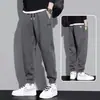 Pantalones térmicos con forro polar transfronterizos, nuevo estilo otoño/invierno, nuevos pantalones deportivos, pantalones de chándal casual para niños, pantalones jogger de corte holgado para hombre