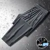 Calça de Seda de Gelo Masculina Nova Verão Secagem Rápida Calça Longa Fina Solta Calça com Ar Condicionado Punho Elástico Tamanho Grande Calça Esportiva Casual