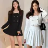 Comercio exterior ropa de mujer 2023 otoño moda coreana abrigo cruzado top temperamento falda corta plisada traje de dos piezas