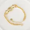 Design de personalidade europeu e americano cheetah de olhos verdes pulseira de zircônia colorida microincrustada moda sensação de alta qualidade temperamento pulseira banhada a ouro de cobre