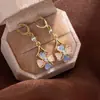 Brincos de Cristal Exquisitos de Flor de Quatro Folhas de Alta Qualidade para Primavera e Verão, Brincos Vazados Femininos, Frescos e Elegantes, Brincos de Luxo Acessível
