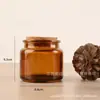 Frascos de vela personalizados con tapones de madera marrón, tazas de vela perfumada de vidrio mini de 200 ml al por mayor en stock, frascos de Biblia para DIY