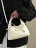 Bolsa de Ombro Elegante e Simples 2026 Nova Bolsa Baguete Vintage Bolsa de Mão Versátil Bolsa de Ombro Meia-Lua