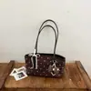 Bolso de Hombro de Lunares Ruien para Mujer Otoño 2026 Nuevo Bolso de Axila Moda de Nicho Bolso de Mano Estilo Dulce Simple