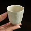 Taza de té de cerámica fabricada en fábrica con diseño floral, tamaño pequeño, taza individual para uso doméstico, taza de degustación de té de alta gama.