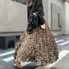 Saia Plissada Estampada Retro Francesa Transfronteiriça para Mulheres 5 Outono e Inverno Nova Cobrindo o Quadril e Saia Grande Saia Evasê Guarda-chuva