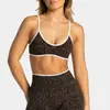 Soporta procesamiento OEM/ODM y personalización Conjunto deportivo de estampado de leopardo para mujer, sujetador y shorts, conjunto de ropa deportiva para exteriores y yoga