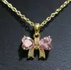 Collar de cobre con forma de lazo irregular con circonita cúbica microincrustada, con diseño de lazo en forma de corazón, un accesorio de moda ligero y versátil