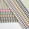 Suministro en Stock: Tela de Camisa Rayada Teñida en Hilo de Burbuja de Algodón-Poliéster, Tela para Vestido y Pantalones de Mujer con Rayas Verticales