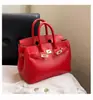 Estilo explosivo de moda transfronteiriça bolsa grande de mão feminina 2026 nova bolsa vermelha de casamento da moda bolsa tote transversal de grande capacidade
