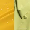 Pantalones de Nailon Chaqueta Tela para Ropa Spandex Elástico en Cuatro Direcciones Transpirable Impermeable Anti-arrugas Agradable al Tacto Tela para Ropa de Diseñador