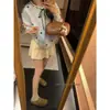 Elegante y chic cárdigan de punto estilo francés con ribete de encaje, con un diseño juvenil, lazo en forma de corazón y detalles de amarre para mujer