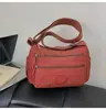 Bolso multicapa casual para mujer, estilo nuevo, ligero, de un solo hombro, bandolera, urbano, simple, para madres de mediana edad y mayores, bolsa pequeña de tela, transfronterizo