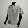Camisa Listrada Retro Japonesa Nova da Moda de Manga Curta, Verão Soltinha Versátil com Bolso de Meia-Manga