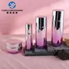En stock: Juego de botellas de vidrio plano redondo electroplateado de 100 ml, 30 ml, botella de loción de 120 ml, juego de frascos de crema de 30 g, 50 g
