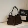 2026 Nova Tendência Nicho Versátil Camurça Pelúcia Bolsa Tote Feminina Grande Capacidade para o Dia a Dia Ombro Único Transversal Simples Bolsa Feminina